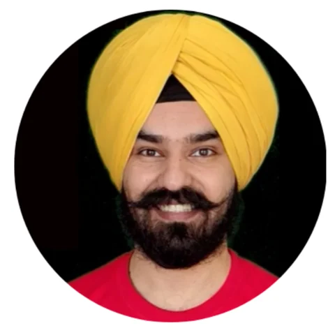 Gurmeet Singh, founder of PunjabiCharm — smiling, wearing a yellow turban